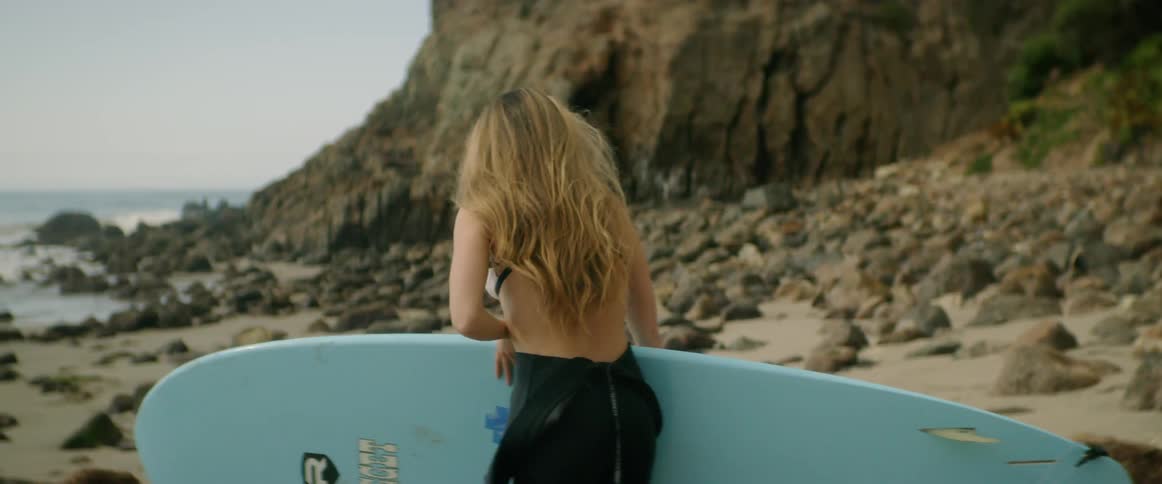 Young Woman Meditating And Surfing