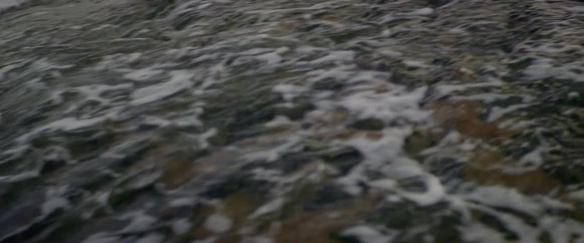 Waves crashing on rocks