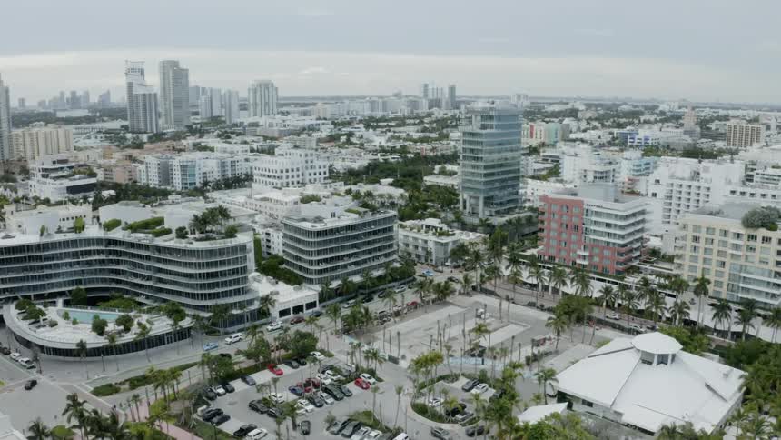 A city is full of large buildings and skyscrapers
