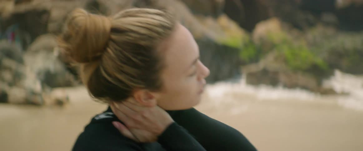 Young Woman Meditating And Surfing