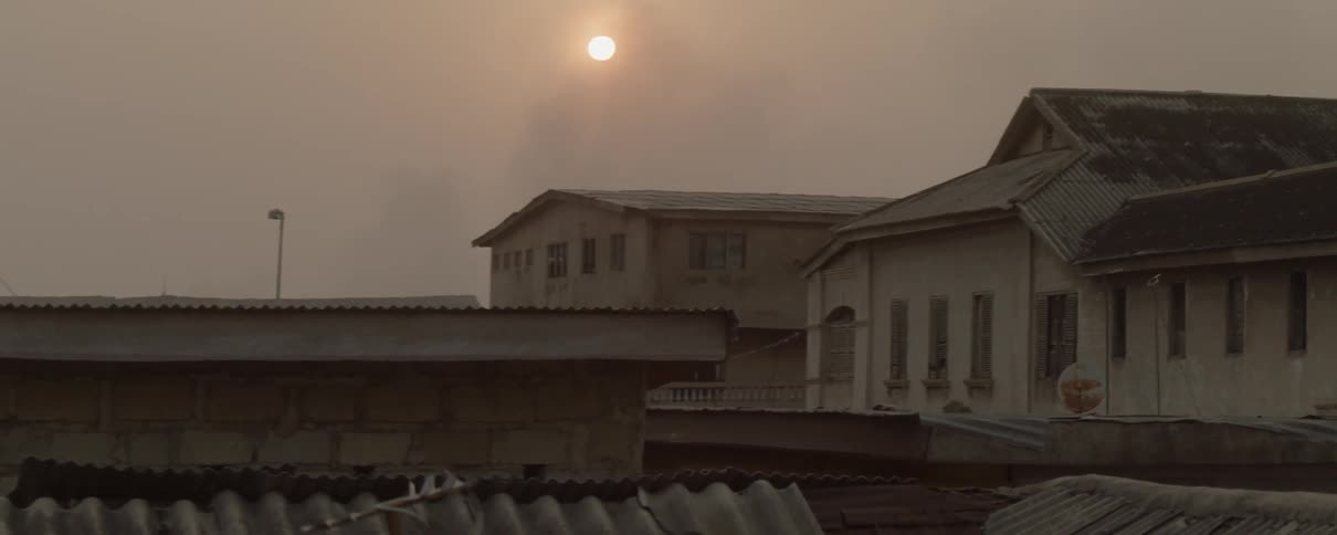 Sun shines over buildings in the city