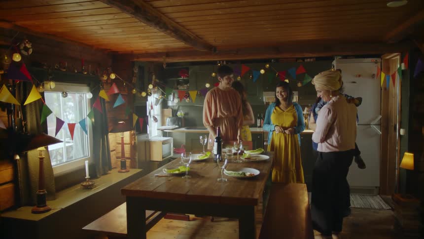 A group of people around a dining table