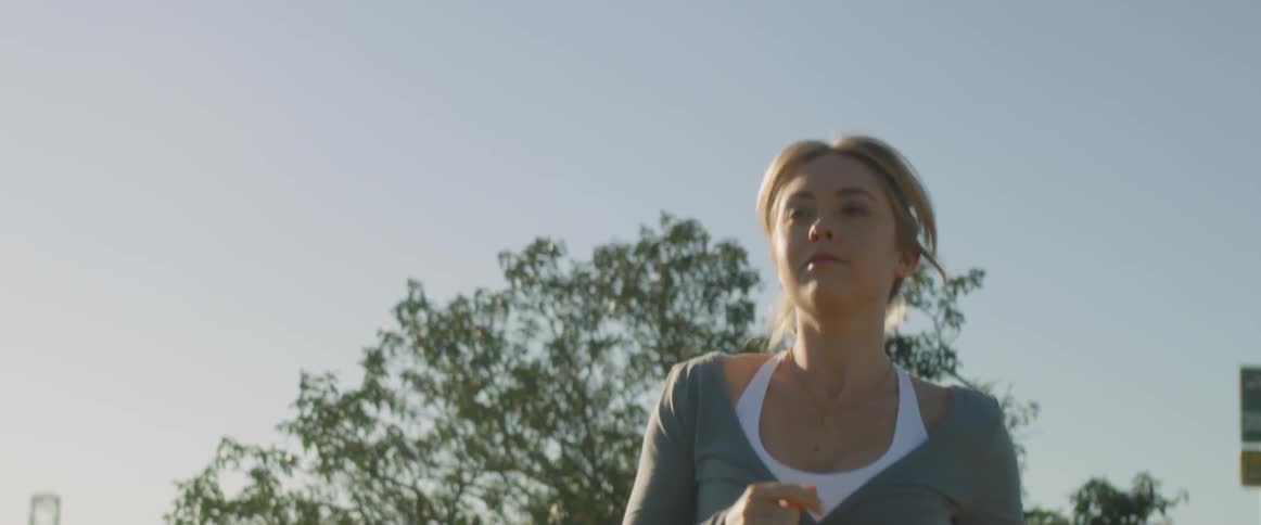 Woman running on a sunny day