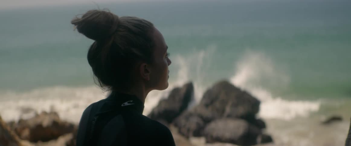 Young Woman Meditating And Surfing