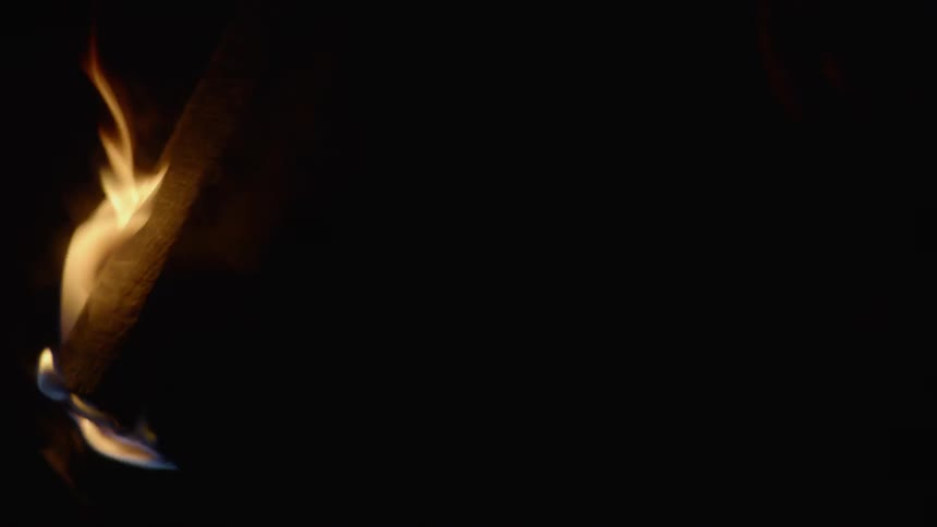 burning torch in the dark