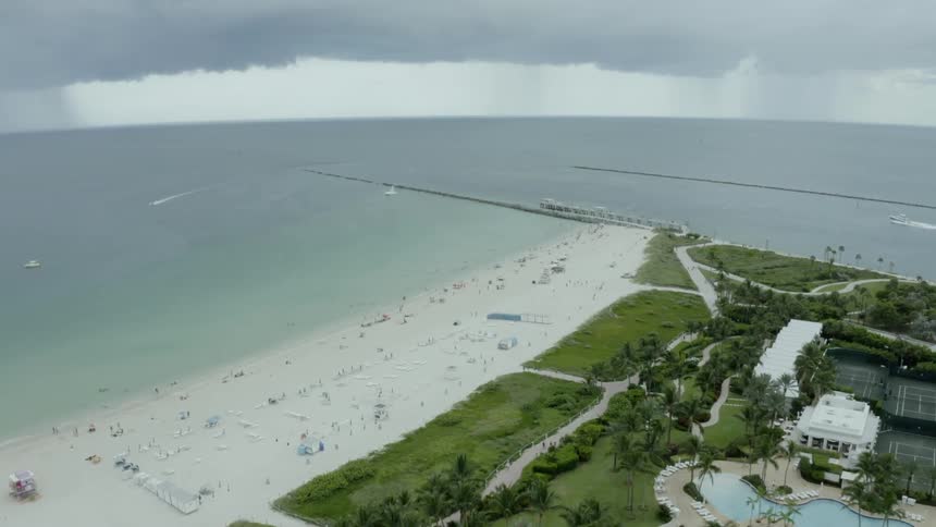 Clouds are moving along the beach