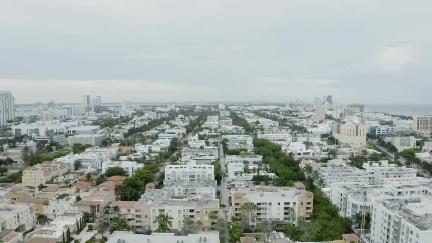 A large city sky view of tall buildings and resorts