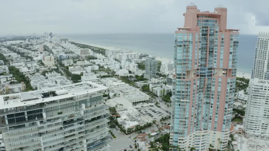 A view of some buildings that are next to the coast