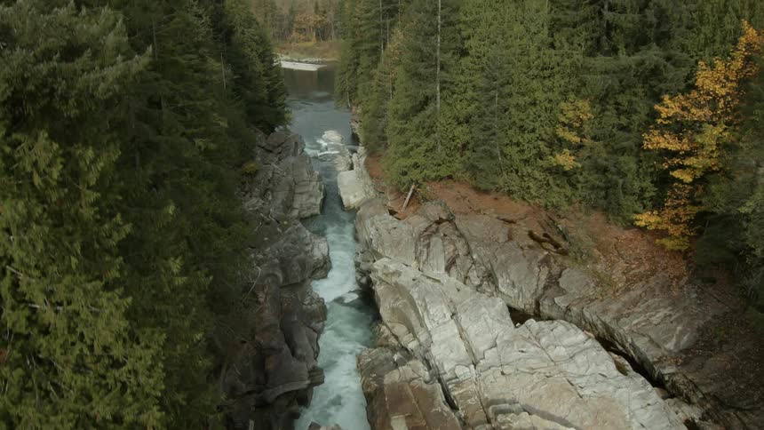A waterfall cascades over a mountain