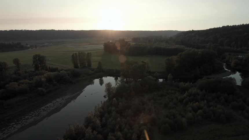 A stream runs along a farm
