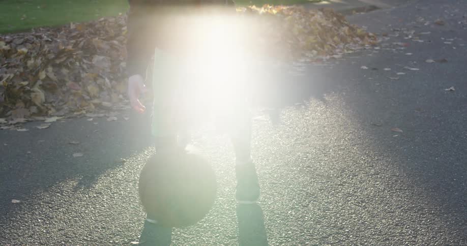A person dribbling a basketball