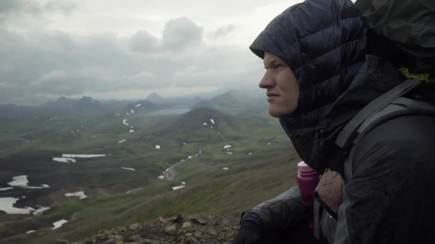 A man overlooking a mountain valley