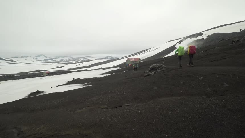 People are hiking outdoors in winter