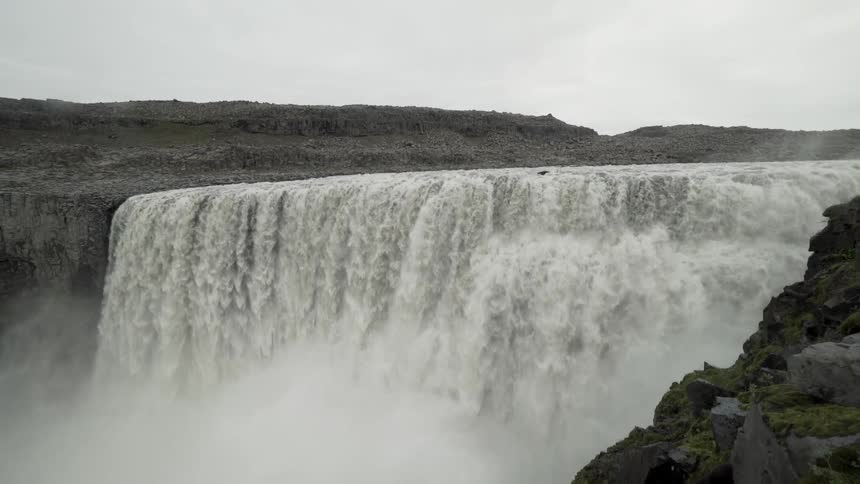 A waterfall is falling