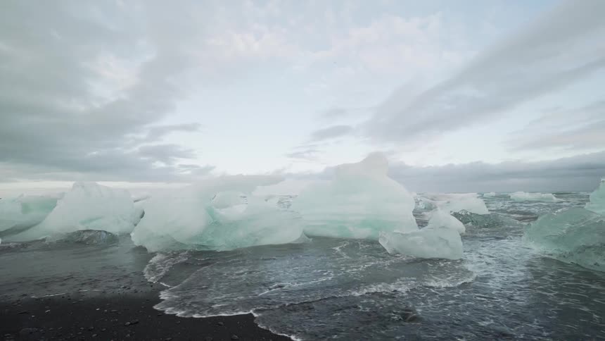 Ocean waves are moving towards the coast in winter