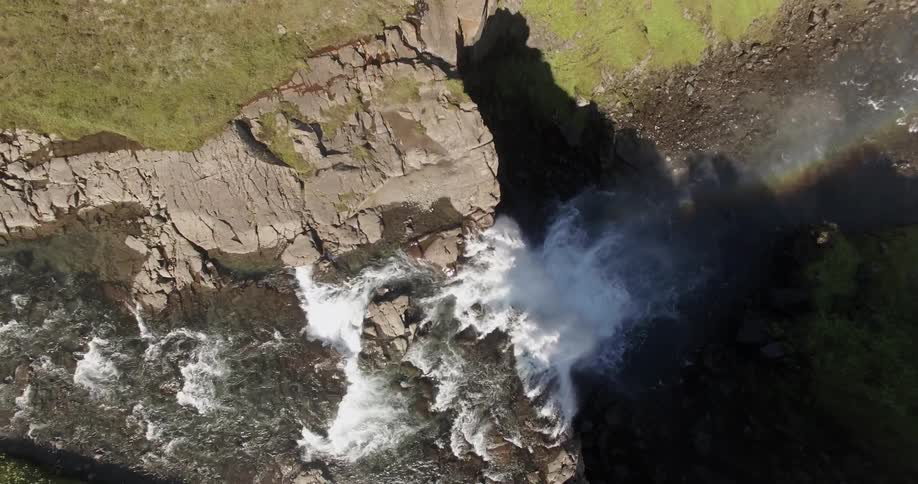 Water is falling off a cliff