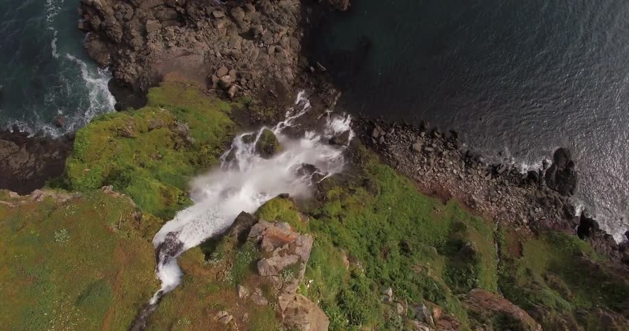 Water falling off a cliff