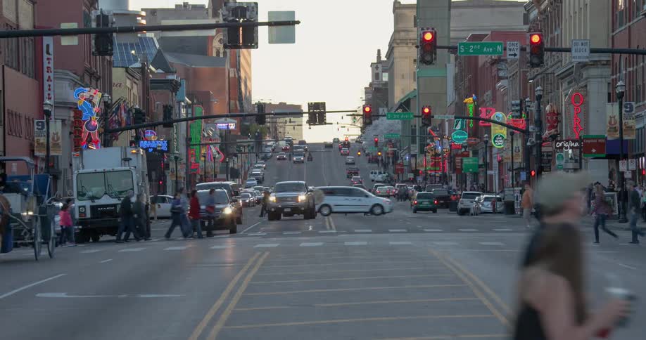 Vehicles and pedestrians commuting in a city