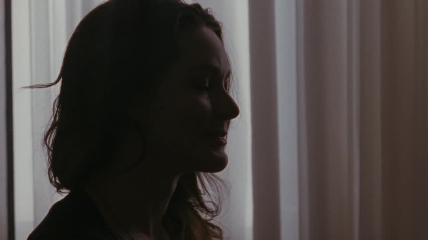 A woman talking and smiling