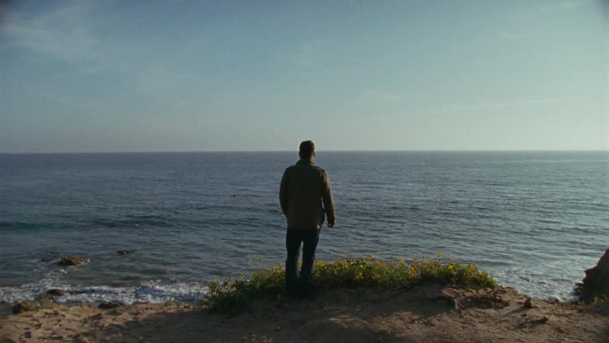 A person staring off at the horizon