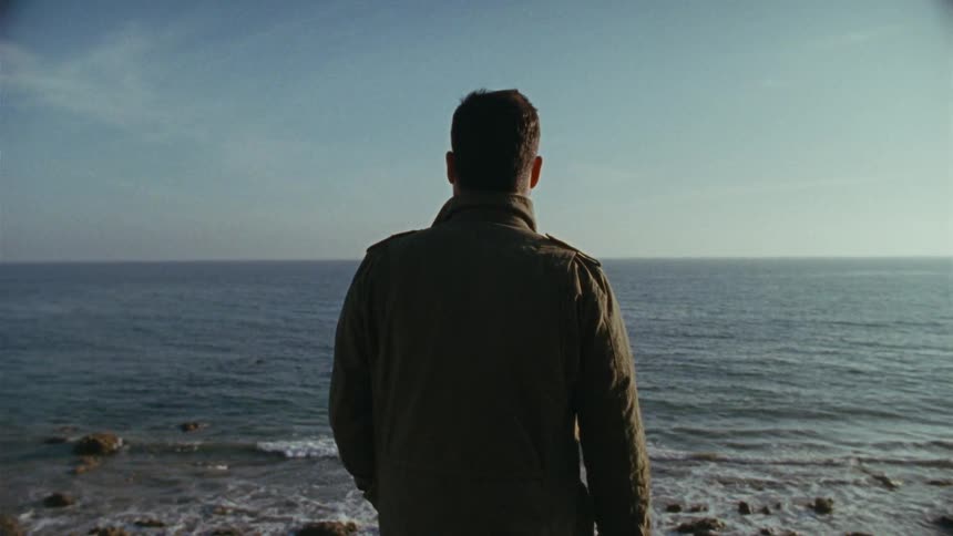 A person staring off at the horizon