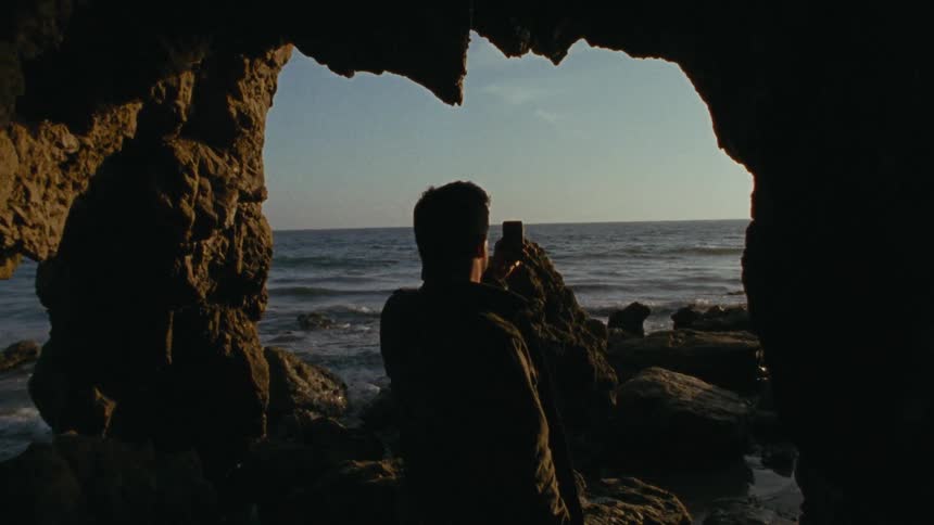 Person is standing on the beach