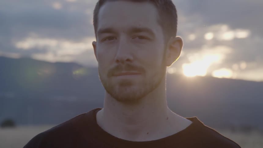 A person standing in front of the horizon