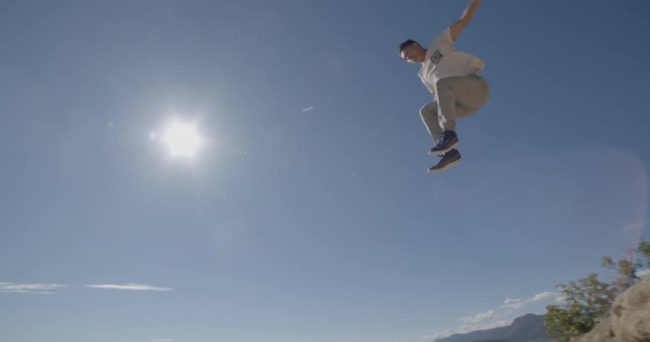 A man is running off a cliff