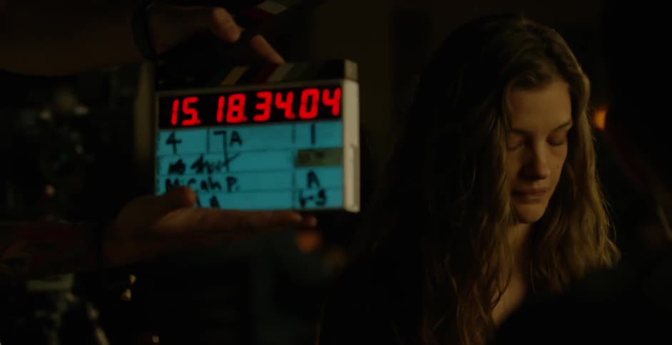 An actress talks before starting a take