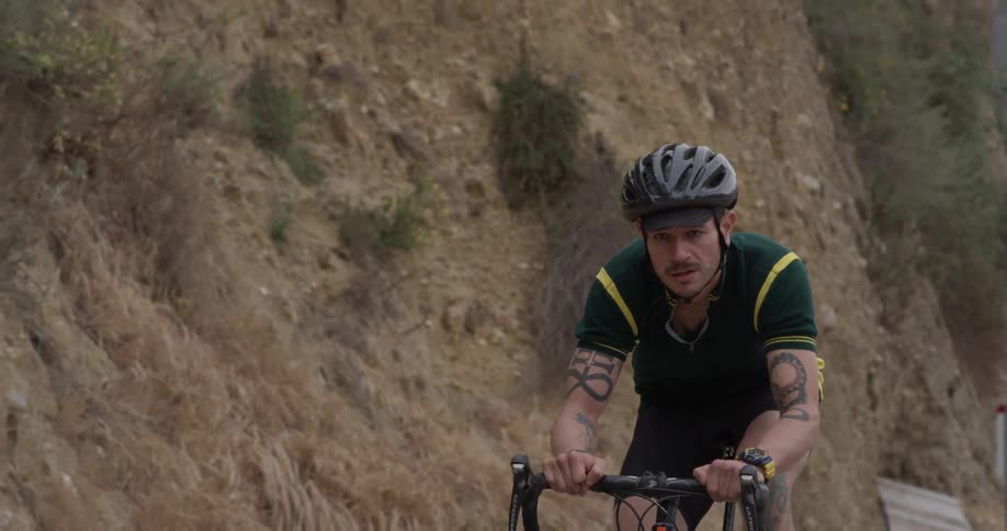 A man is riding a bike