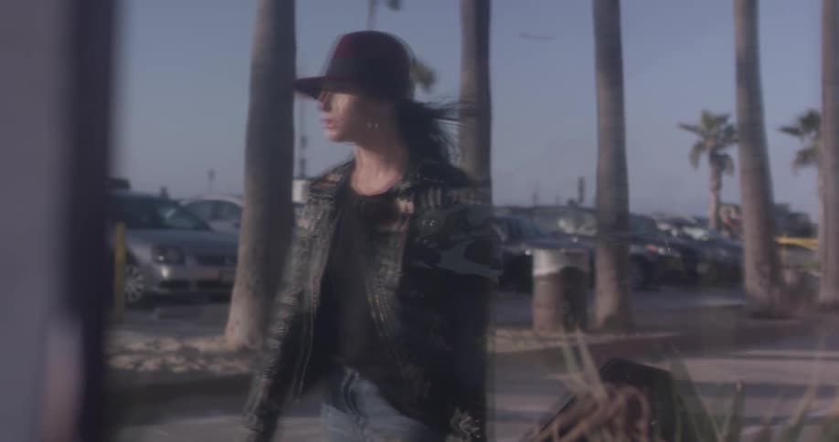 Girl Playing Guitar By The Beach