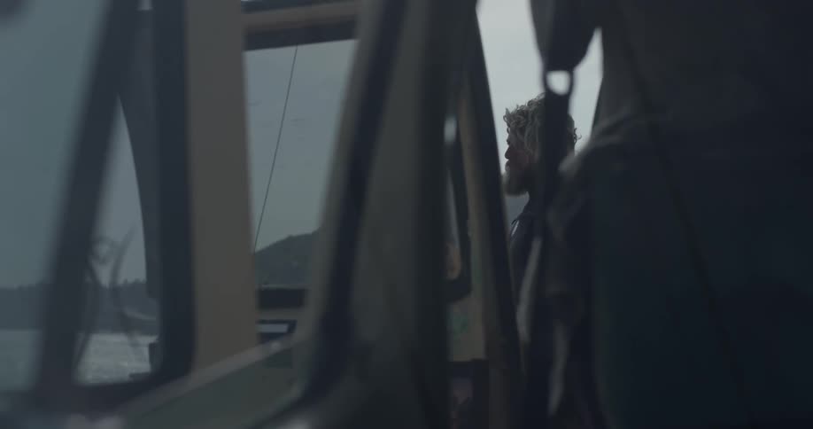 Man Driving To Beach And Surfing