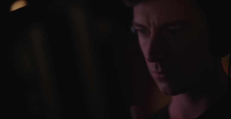 Close up of a man's face as he concentrates