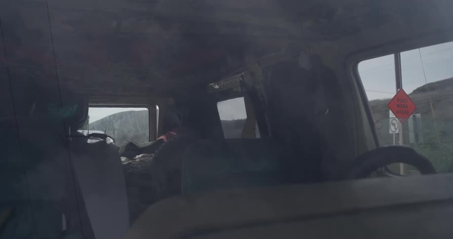 Man Driving To Beach And Surfing