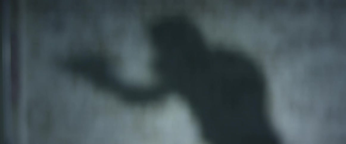 A man is boxing indoors