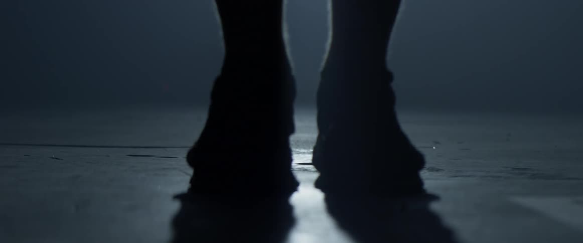 A man is jumping rope indoors