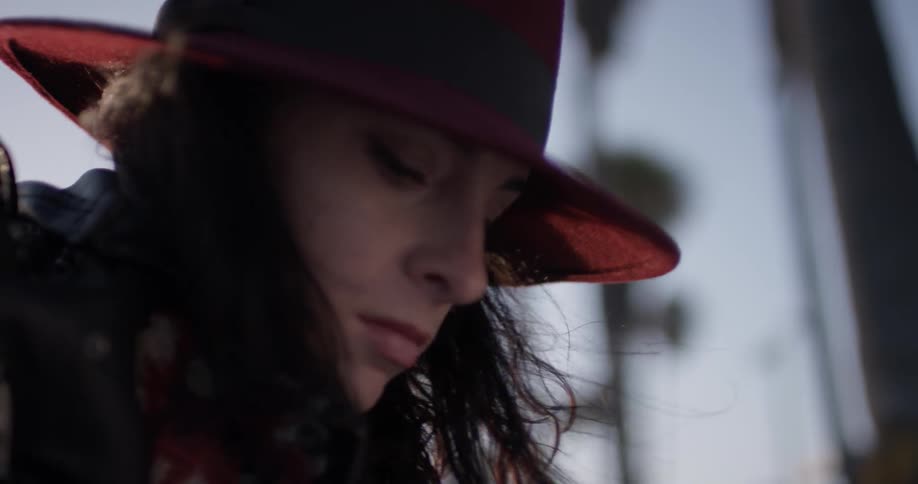 A woman moves back and forth to the music
