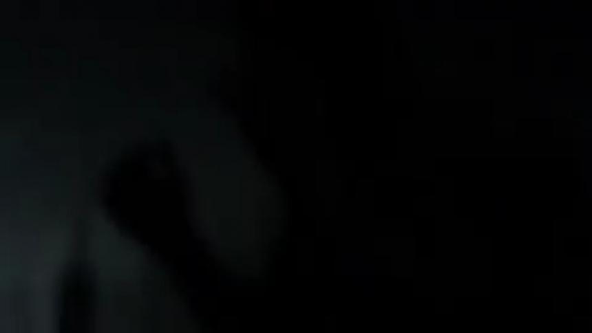 White dot floating on a black screen