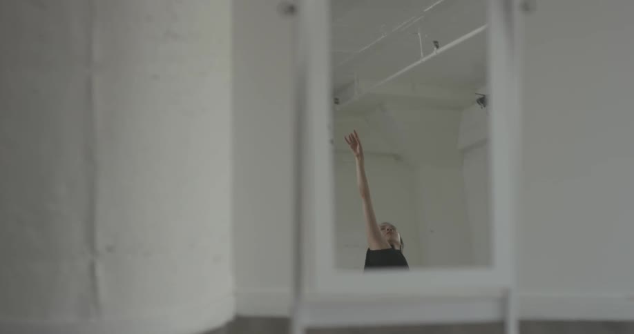 A woman is dancing by herself