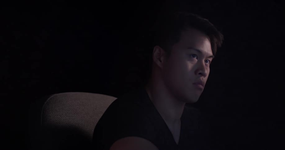 Man Coding On Computer In Dark Room