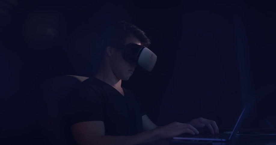 A man has a virtual reality set on