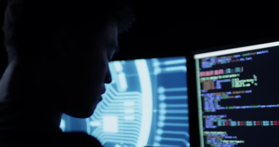 Closeup of man working at a computer