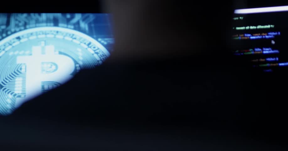 Man Coding On Computer In Dark Room