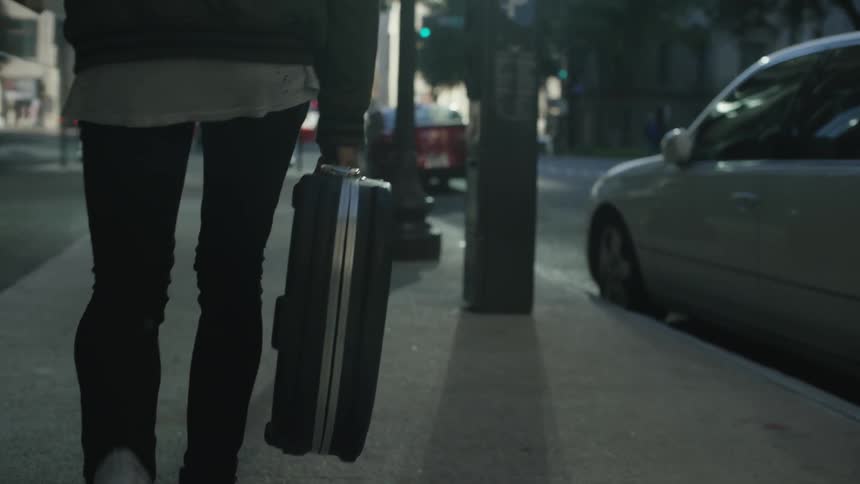 Person is carrying their luggage