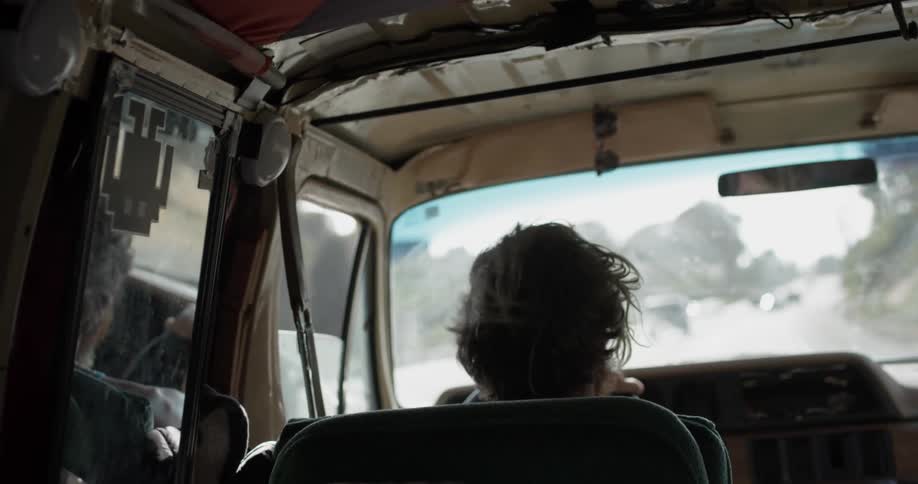 Man Driving To Beach And Surfing