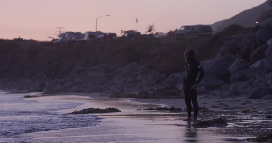 Man Driving To Beach And Surfing