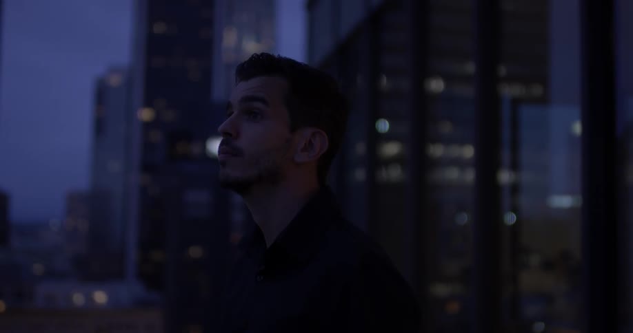 Man Inside High Rise Apartment