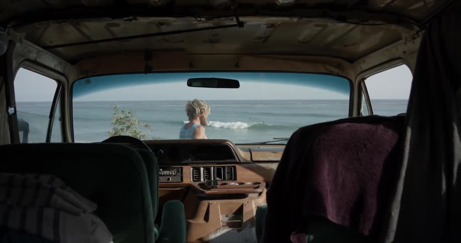 Man Driving To Beach And Surfing