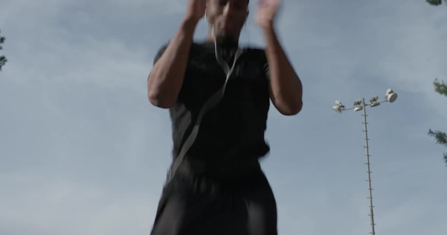 A man exercises outside