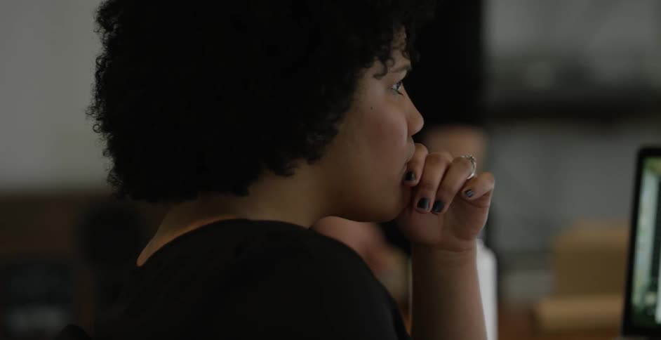 A person with curly hair